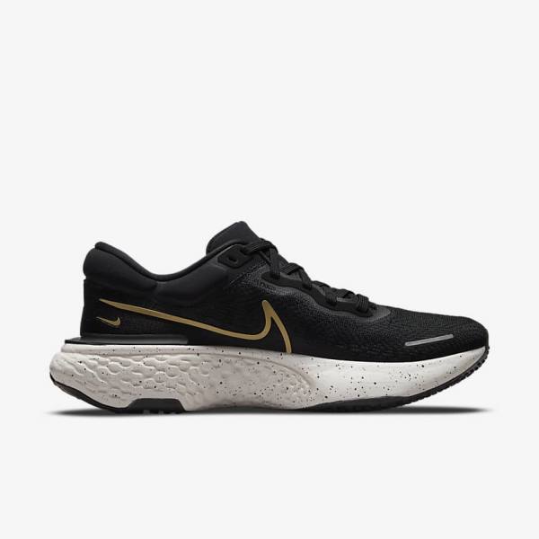 Zapatillas Running Nike ZoomX Invincible Run Flyknit Carretera Hombre Negras Metal Doradas | NK608FAQ